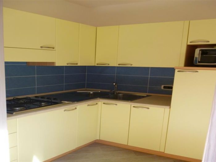 Foto di Appartamenti Andreis a Malcesine con balcone vista lago, uso giardino e piscina