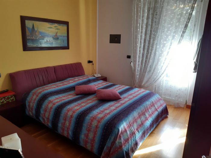 Foto di Appartamenti Andreis a Malcesine con balcone vista lago, uso giardino e piscina