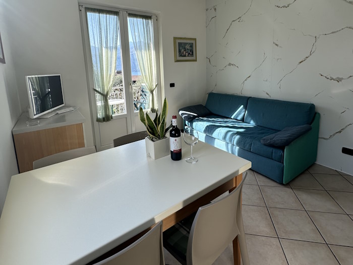 Photos of Apartments Andreis in Malcesine with balcony overlooking the lake, garden and pool